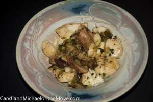 Scallops with a garlic, Skitake mushroom sauce, served over tortellinis