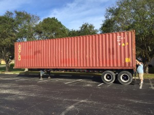 Look at the height of the floor of the container. It's about 5 feet off the ground!