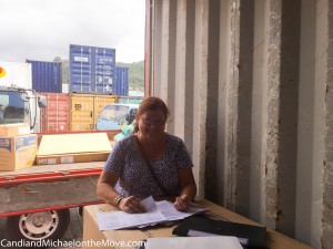 Checking off the inventory as it is being unloaded. 