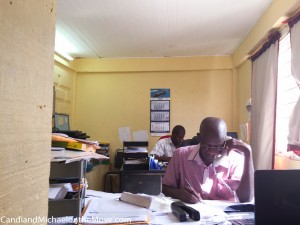 Mr. George, patiently calculating all the duty, while helping other customers on the phone. He never slowed down and rarely looked at the customs book for prices. Amazing!