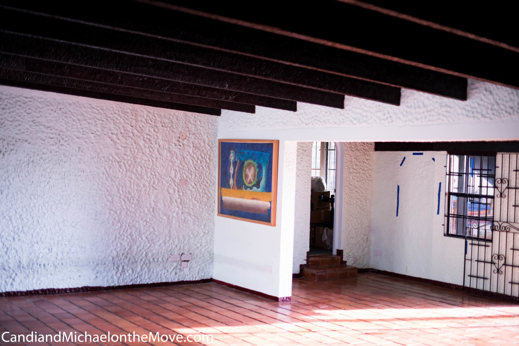 Another "before" picture - you can see the tiled floor, concrete walls and the step up to a bedroom - all good things for a room that will not have a roof for a couple of weeks..