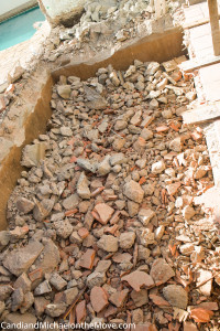 All this rubble which is filling up the cistern needs to be lifted out, wheel barrowed away and then trucked away. 