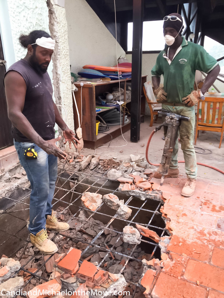 The start of the jack hammering. Check out the jackahmmer. Can you believe they are walking on top of the rebar? YIKES!