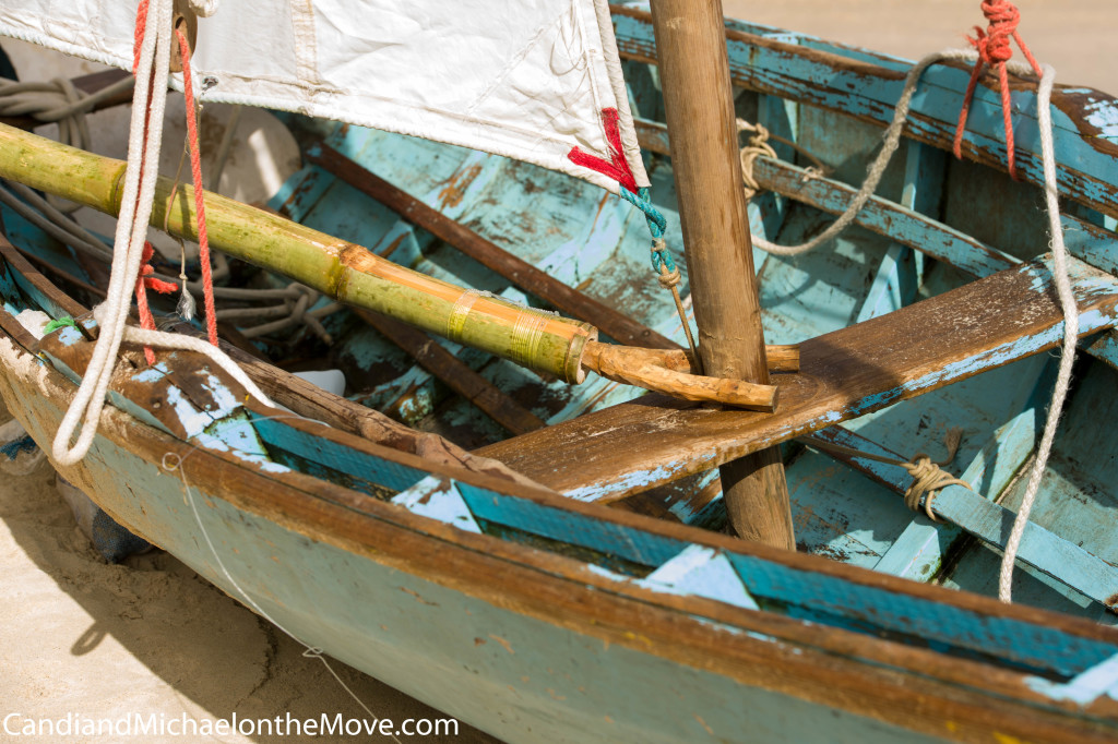 This is a great shot showing the condition of the average work boat and their makeshift masts. This is a very typical set up with bamboo booms.