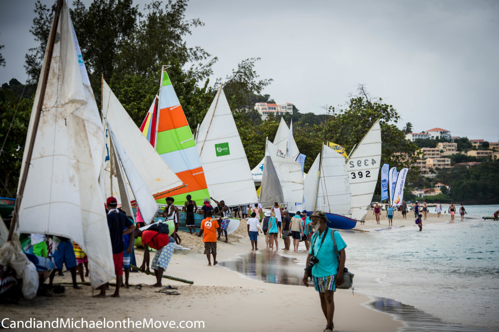 The work boats are rigged and line the beach waiting to be called for their village race. there is tremendous competition between the fishing villages for the distinction of Champion of Champions.