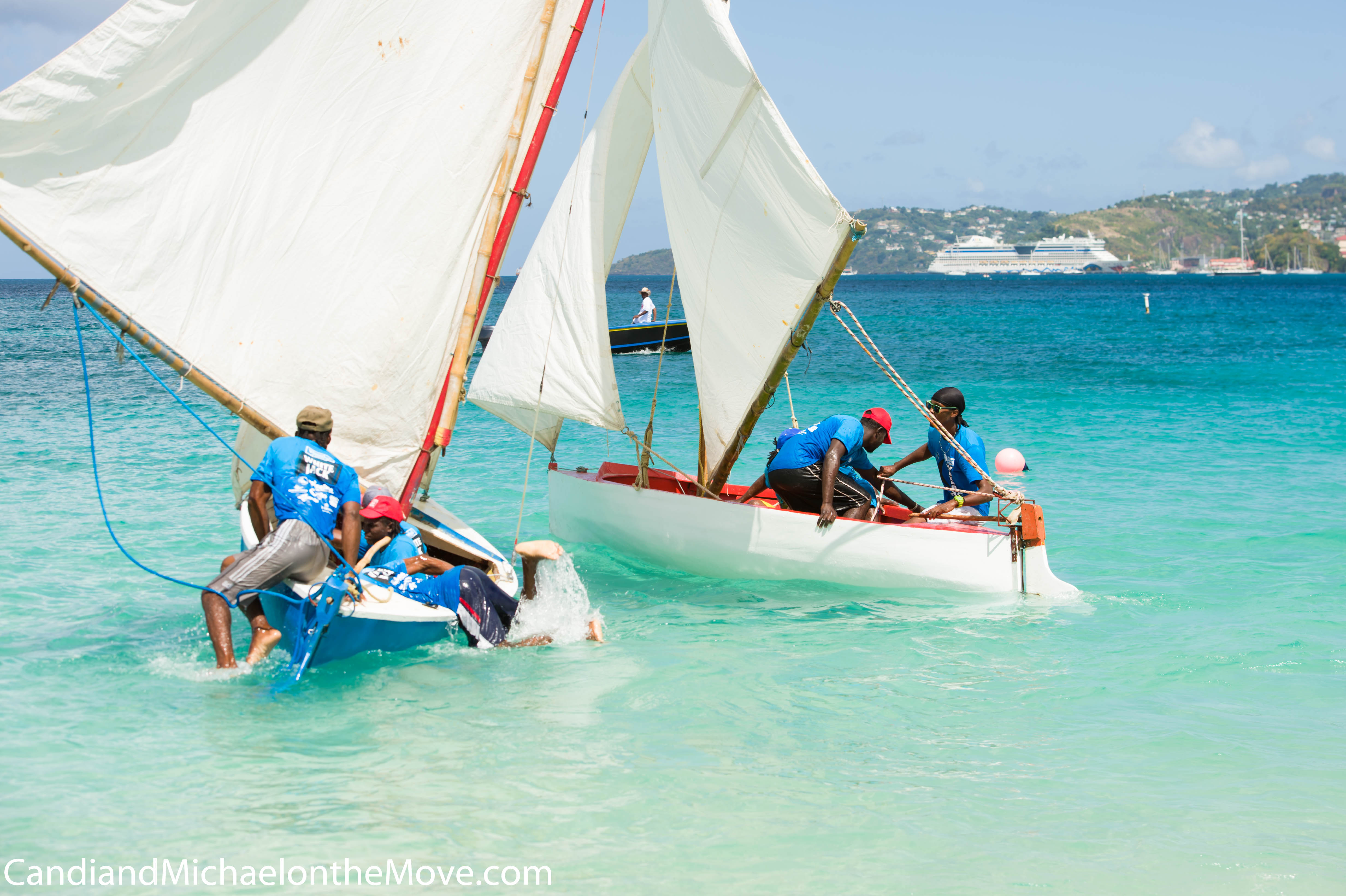 feet flailing and the last sailor dives into the boat